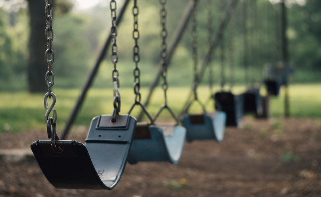 Photo of swings at a park