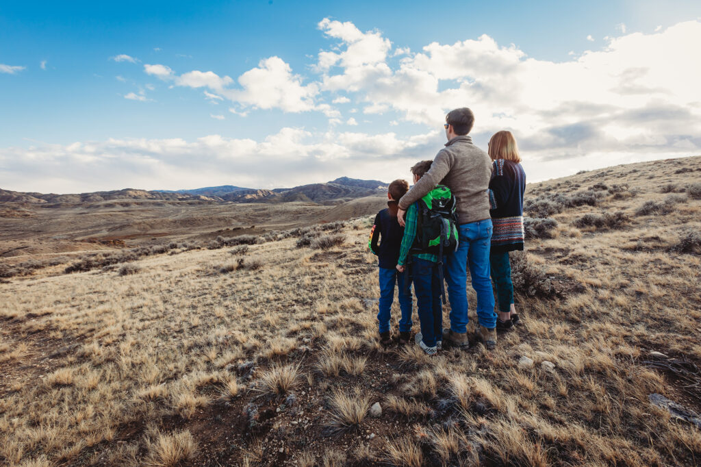 Photo of a family looking over McCullough Peaks Stay and Play in Powell Wyoming