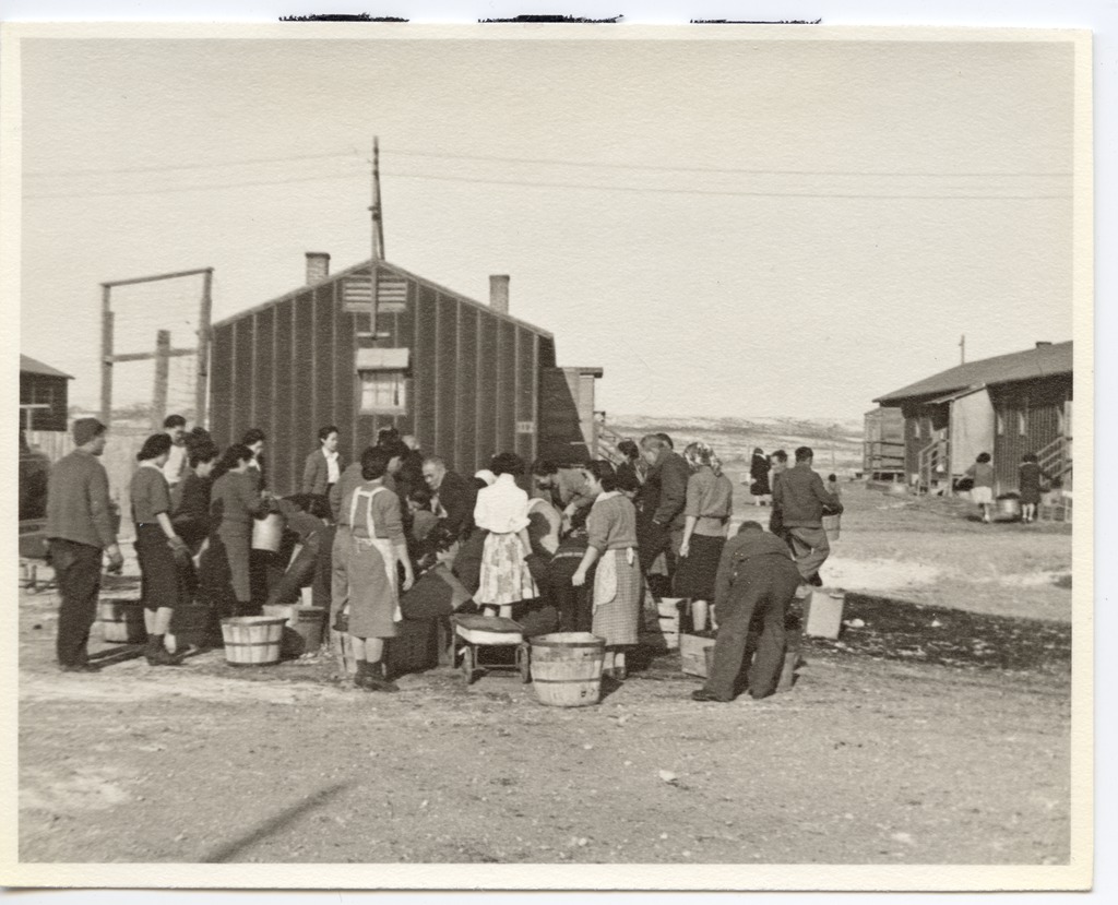 People assembling at the Heart Mountain Incarceration Camp.