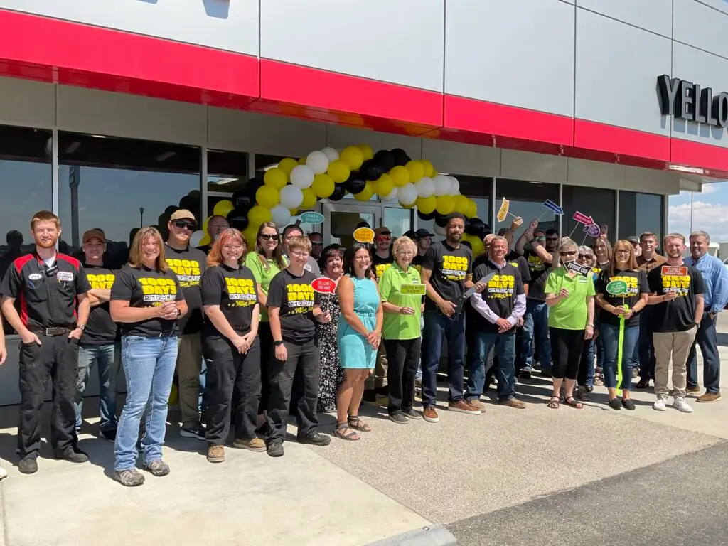 Powell Chamber of Commerce Ambassadors attending a milestone ribbon cutting ceremony at Yellowstone Motors in Powell, Wyoming