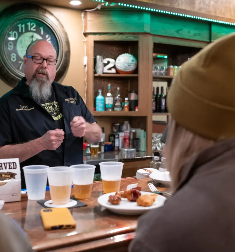 Steve, the head brewer of WYOld West Brewing Company in Powell, Wyoming, talking to bar patrons